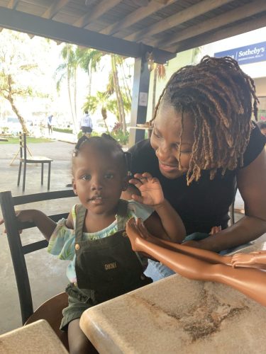 Gracie with auntie during port visit in Jamaica